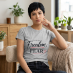 20260818020006-1f19aa88-8d12-6568-b49a-76aa9f55d07e.png Choose Freedom Instead of Fear Women’s Tee | Inspirational Graphic T-Shirt